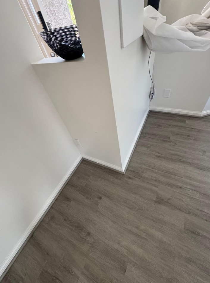 water-damaged Carpet Replacement with Waterproof LVP Flooring Installation - фото - 3