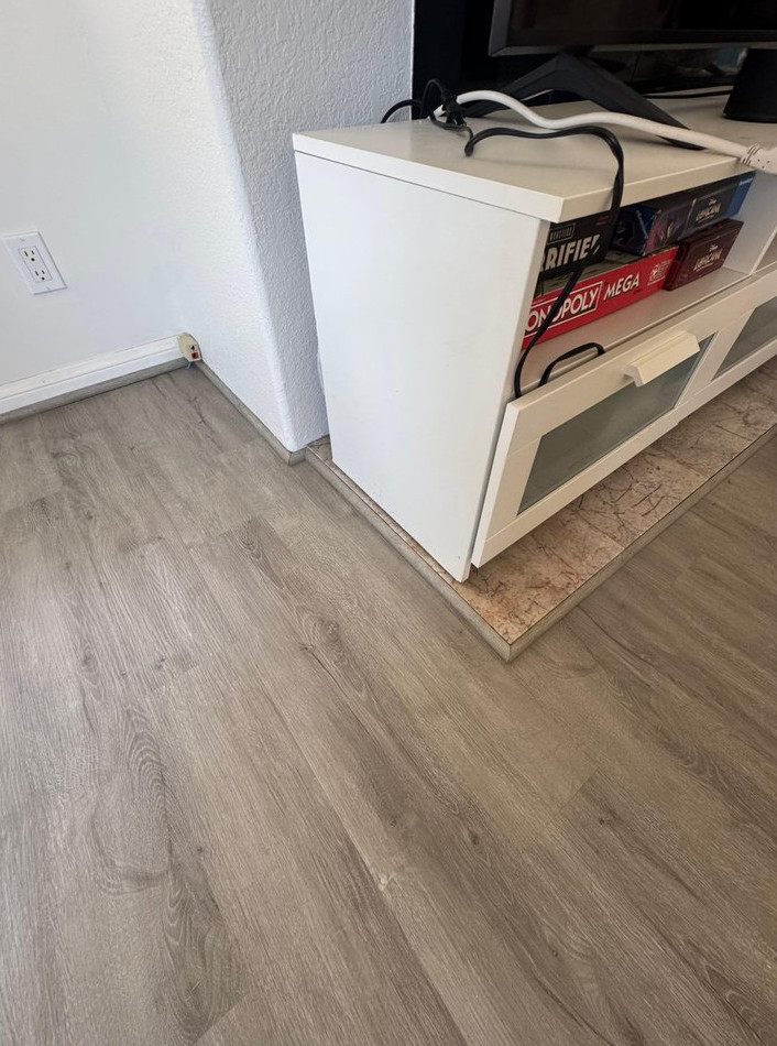 water-damaged Carpet Replacement with Waterproof LVP Flooring Installation - фото - 12